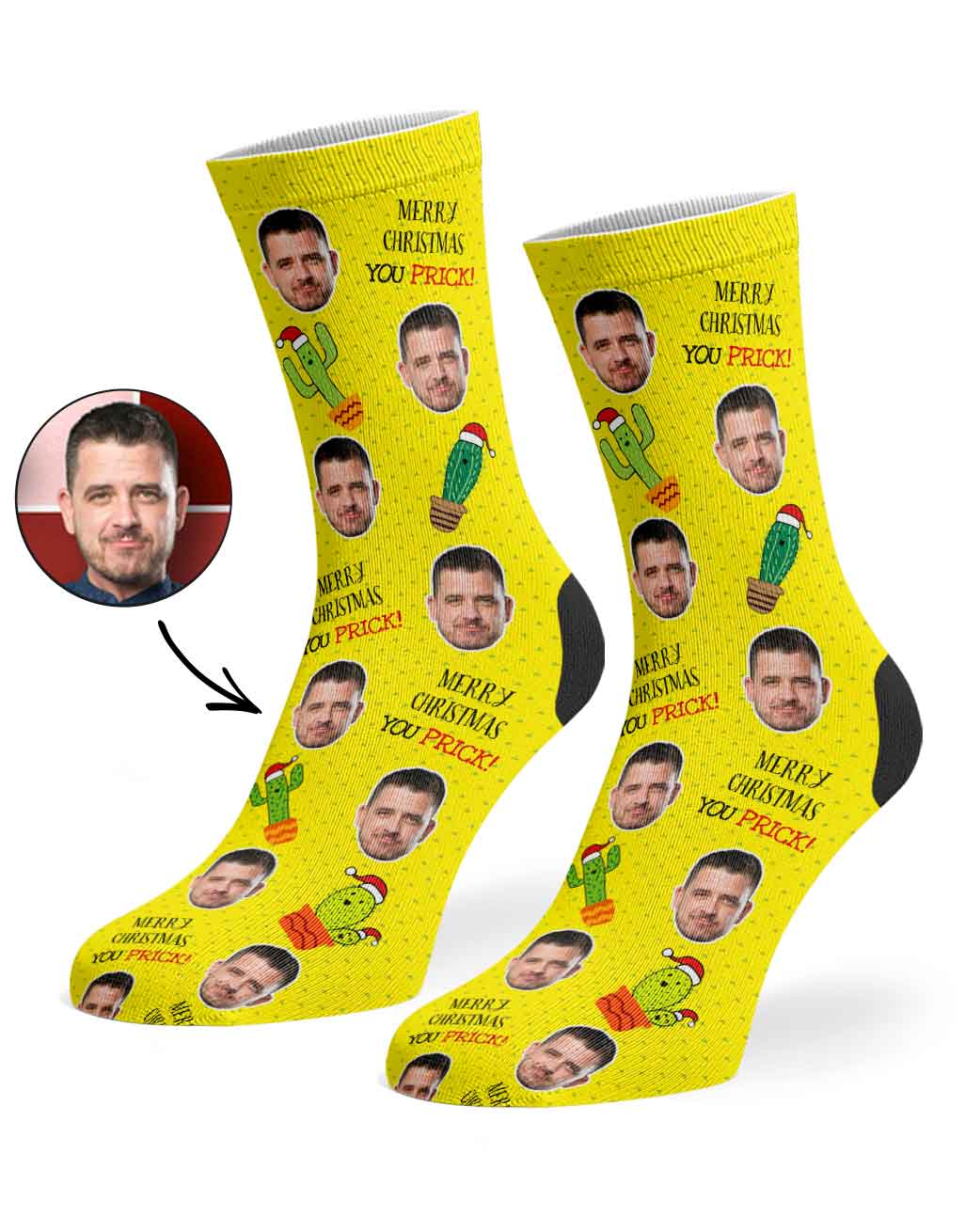Yellow socks with a face printed design on a white background