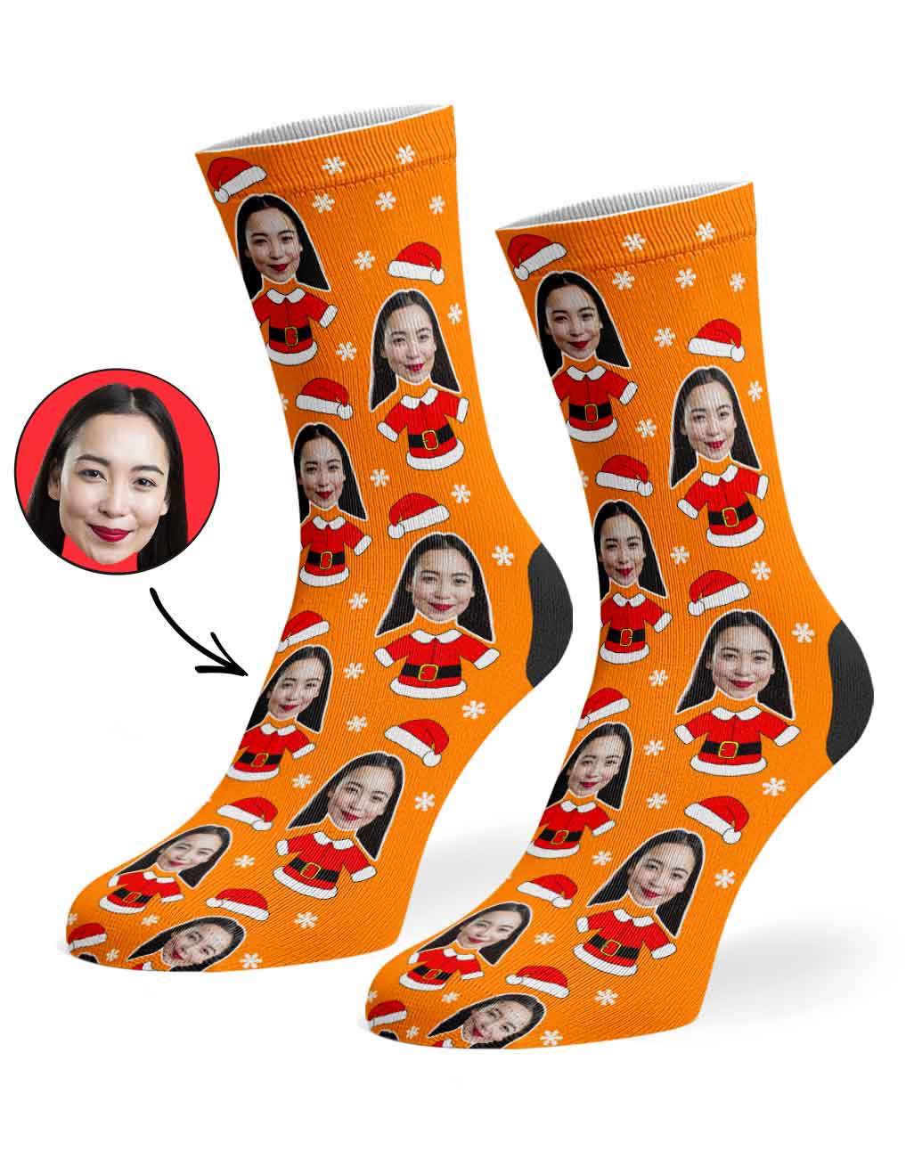 Orange socks with a pattern of a person's face and Santa Claus outfit on a white background.