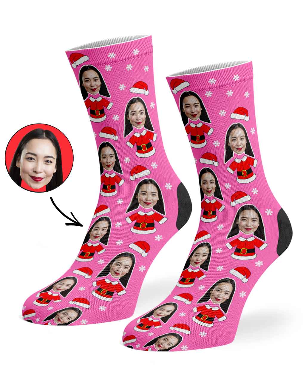 Pink socks with a face printed design on a white background
